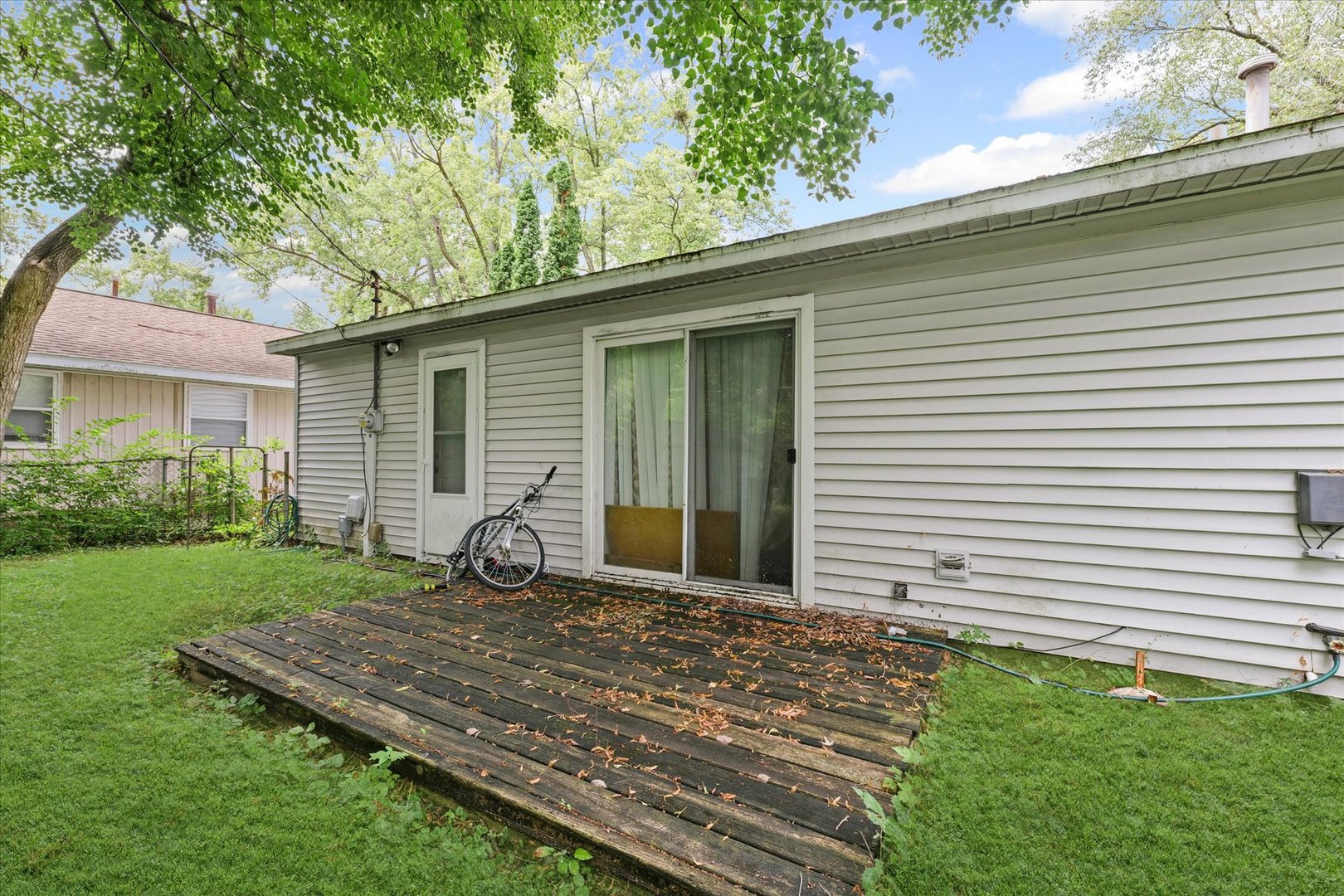 1104 Lanore Drive Urbana, IL 61802 - Photo 15 of 16 a view of a backyard with sitting area