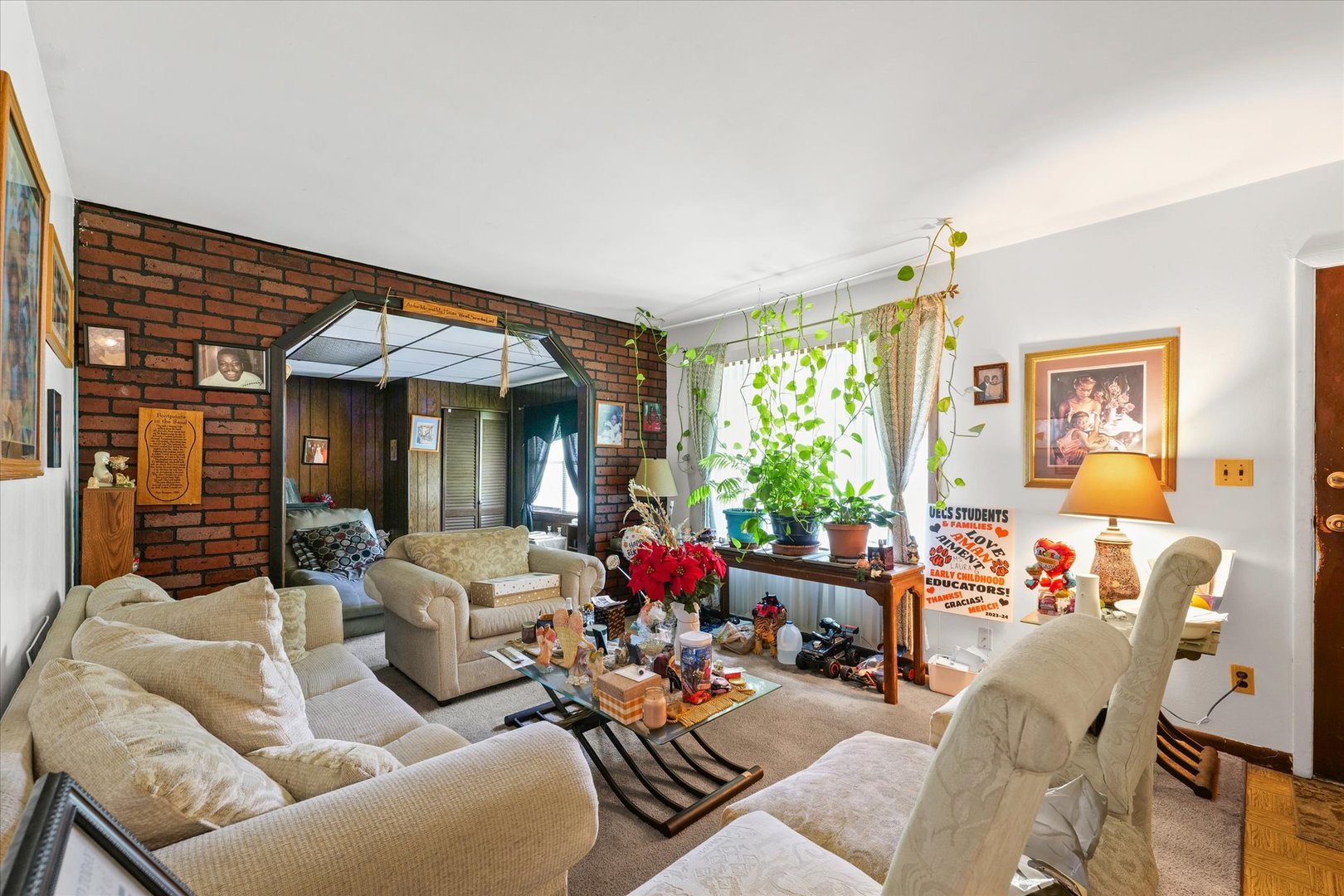 1104 Lanore Drive Urbana, IL 61802 - Photo 5 of 16 a living room with furniture and a large window
