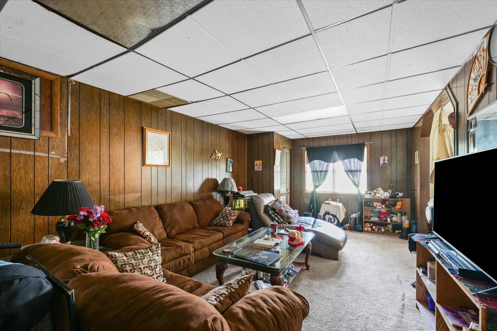 1104 Lanore Drive Urbana, IL 61802 - Photo 6 of 16 a living room with furniture and a flat screen tv