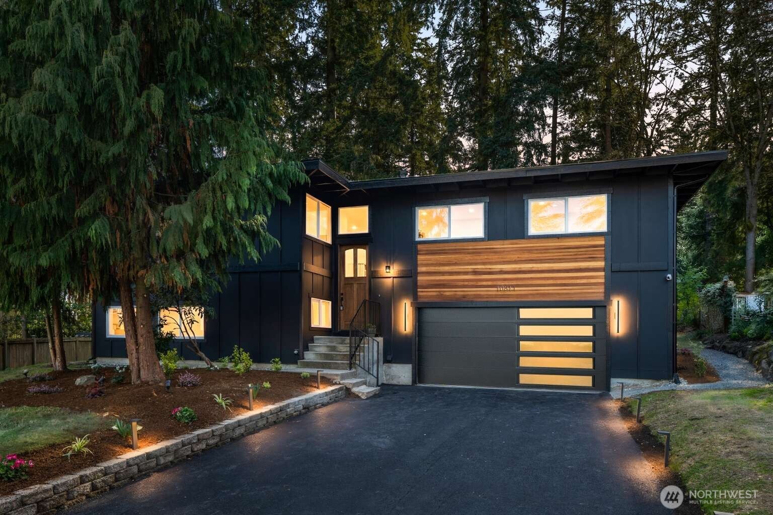 10811 Northeast 154th Court Bothell, WA 98011 - Photo 1 of 28 a front view of a house with a yard