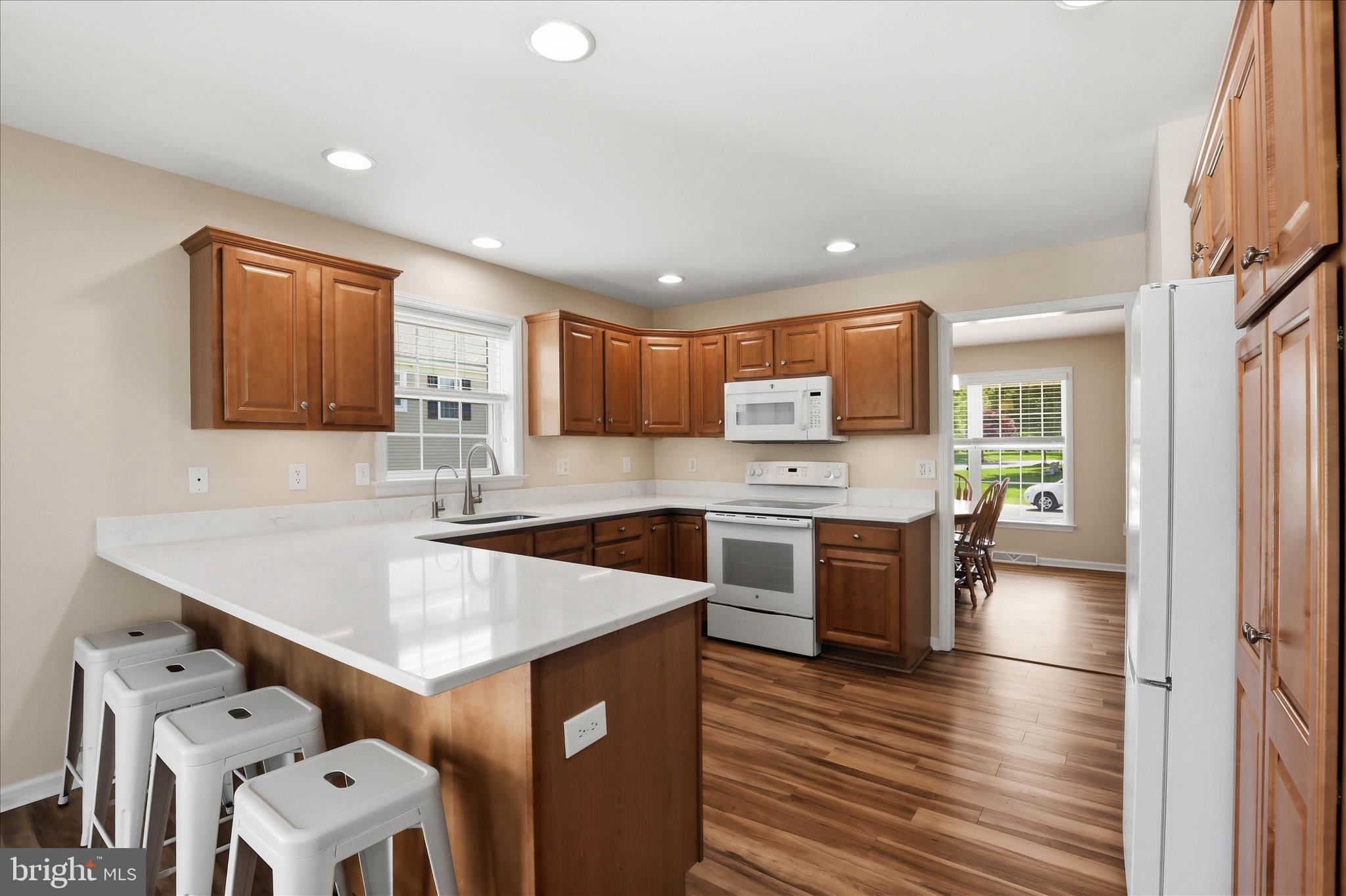 533 Thornberry Lane Lititz, PA 17543 - Photo 13 of 56 a kitchen with granite countertop a sink appliances cabinets and counter space