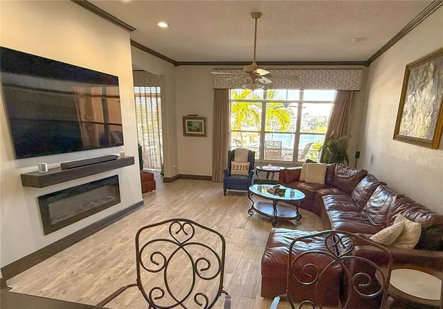a view of room with wooden floor and cabinet