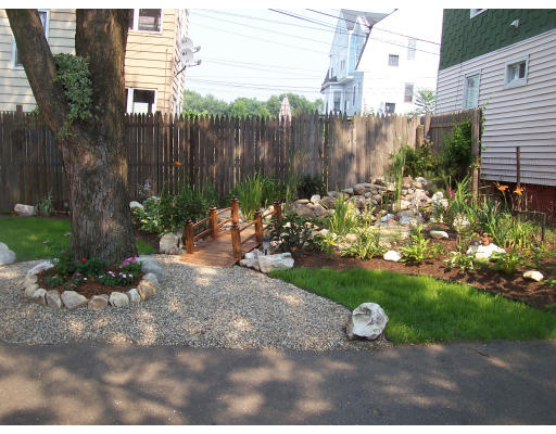 44 Allen Street Springfield, MA 01108 - Photo 5 of 6 a view of a street with a bench