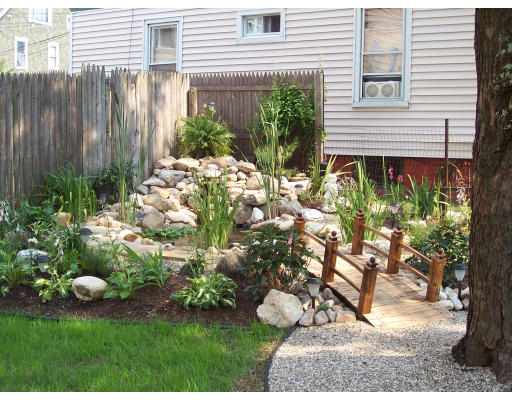44 Allen Street Springfield, MA 01108 - Photo 6 of 6 a backyard of a house with lots of green space