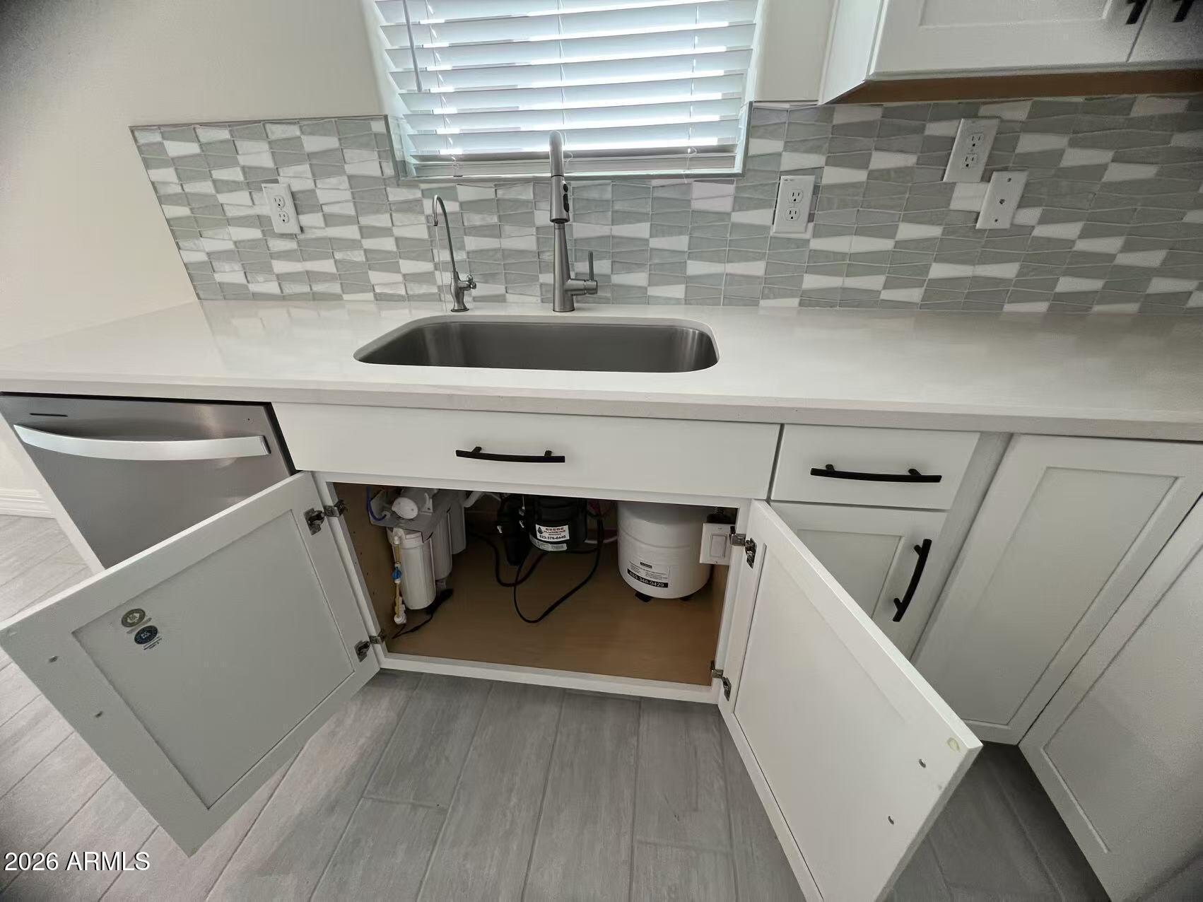 13359 West Eagle Feather Road Peoria, AZ 85383 - Photo 18 of 43 a utility room with dryer and washer
