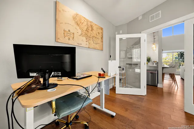 a bedroom with a bed and furniture