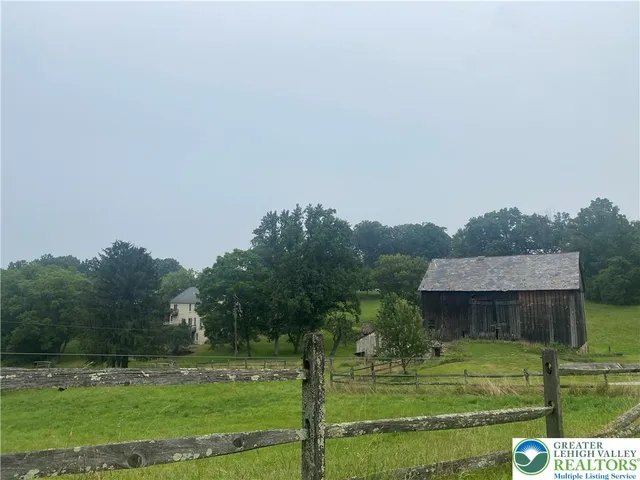 a view of a backyard with garden
