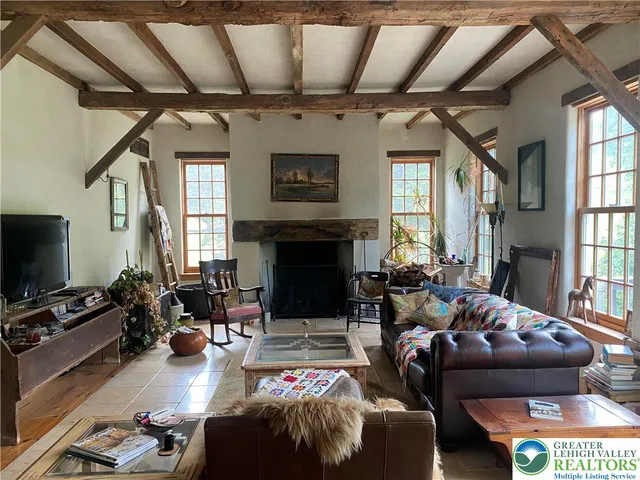 a kitchen with a stove a sink and a refrigerator