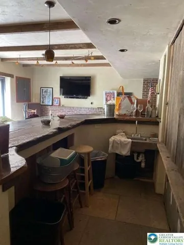 a view of a yard with an outdoor seating