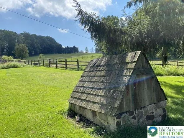 a wooden door in front of a house