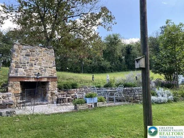 a backyard of a house with lots of green space