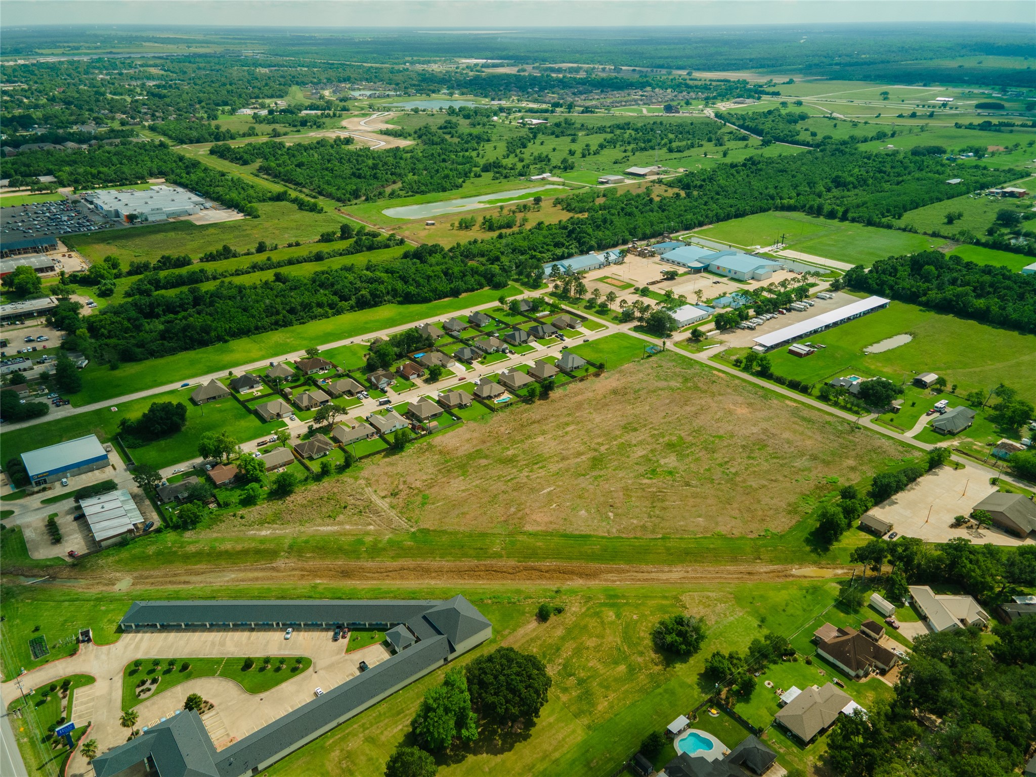 0 Karankawa Street Angleton, TX 77515 - Photo 10 of 22 a view of a city