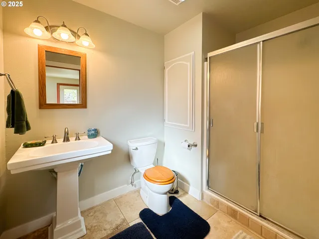 a view of an empty room with brick wall