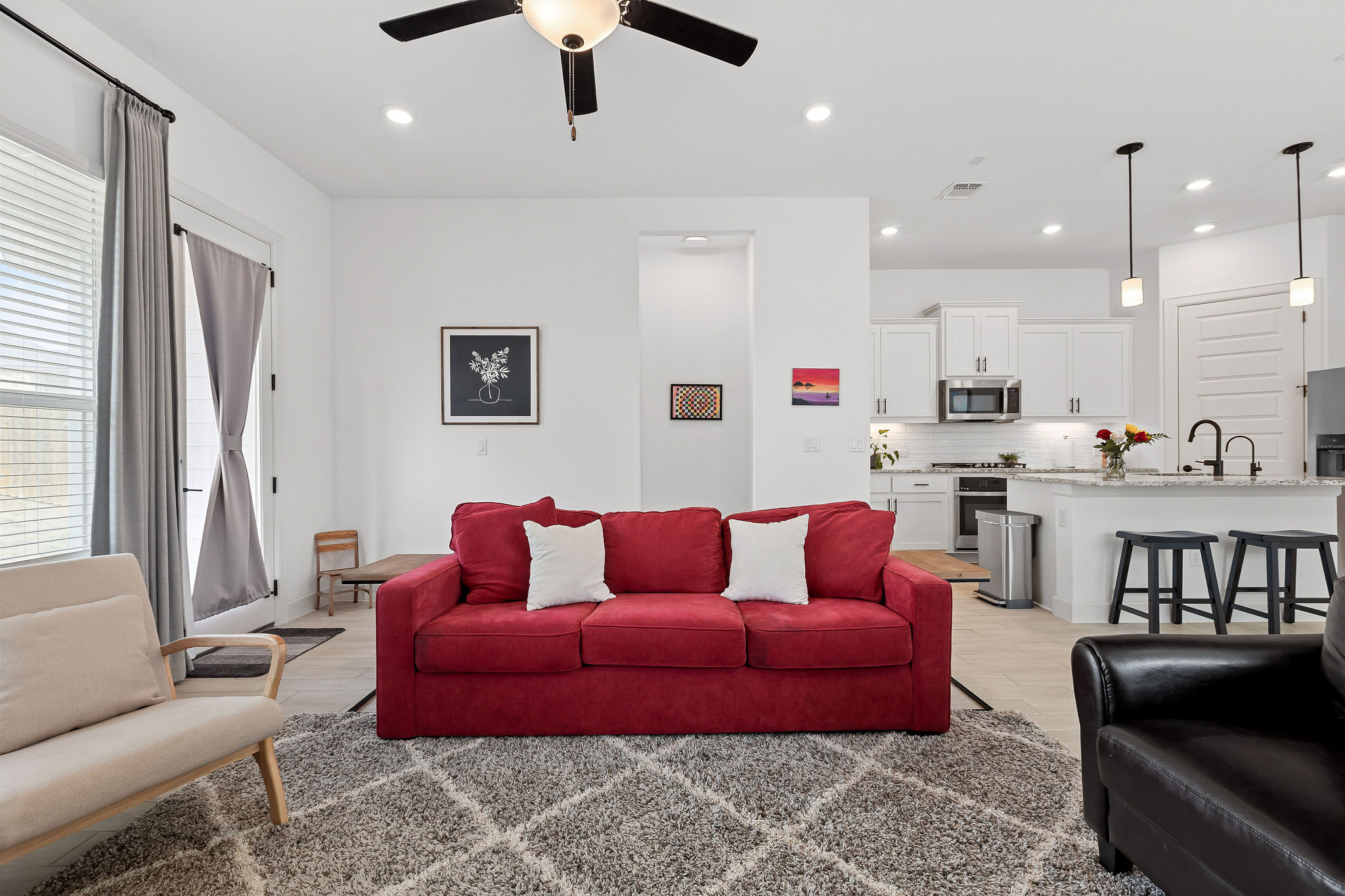 4605 Sea Salt Drive Austin, TX 78747 - Photo 15 of 40 a living room with furniture kitchen view and a window