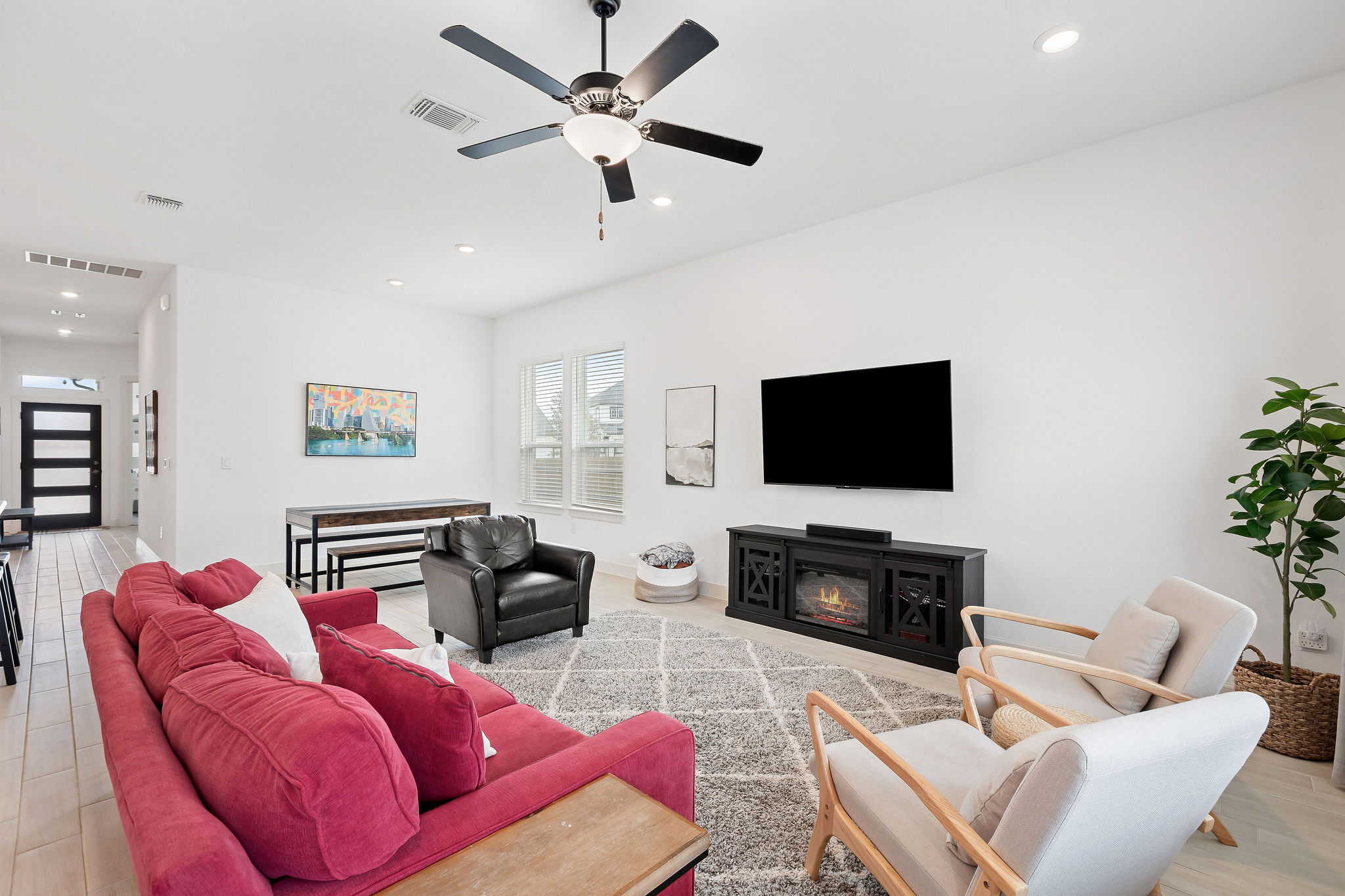 4605 Sea Salt Drive Austin, TX 78747 - Photo 17 of 40 a living room with furniture and a flat screen tv