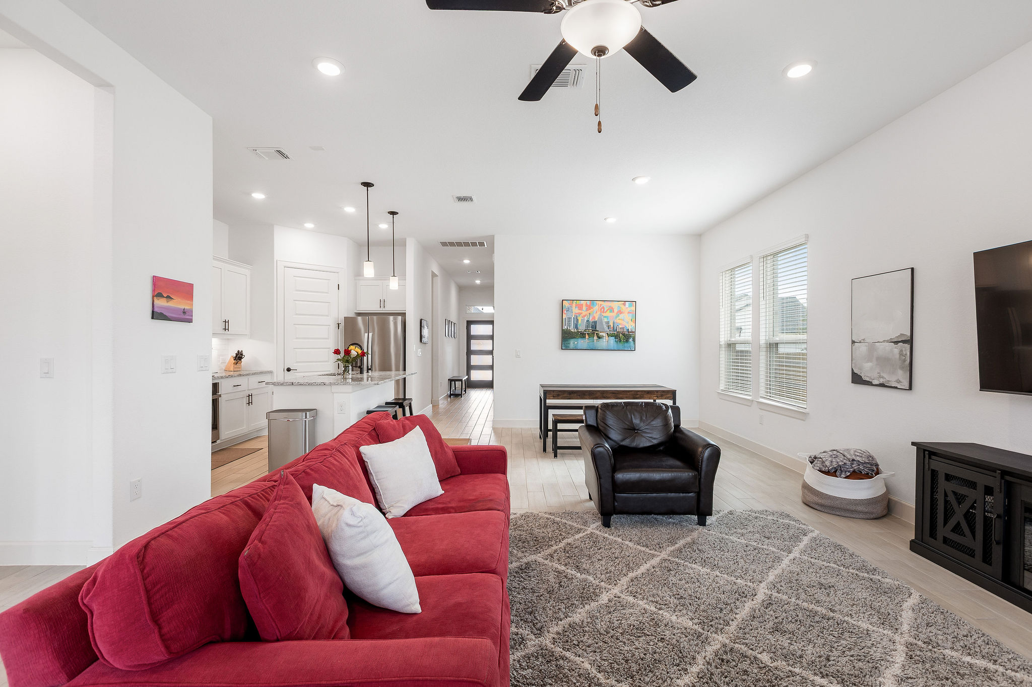 4605 Sea Salt Drive Austin, TX 78747 - Photo 18 of 40 a living room with furniture and a view of kitchen