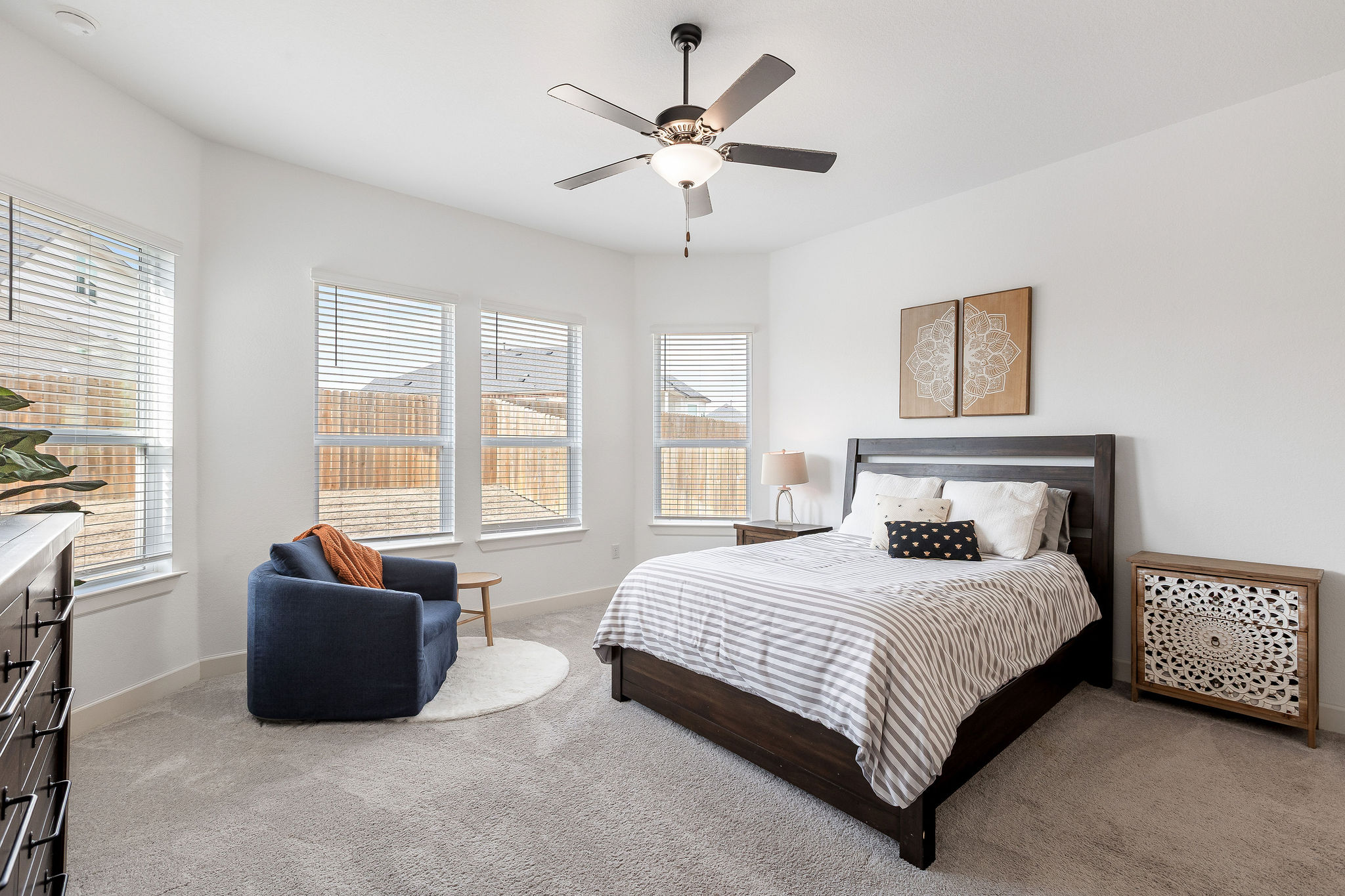 4605 Sea Salt Drive Austin, TX 78747 - Photo 20 of 40 a bedroom with a bed and a couch