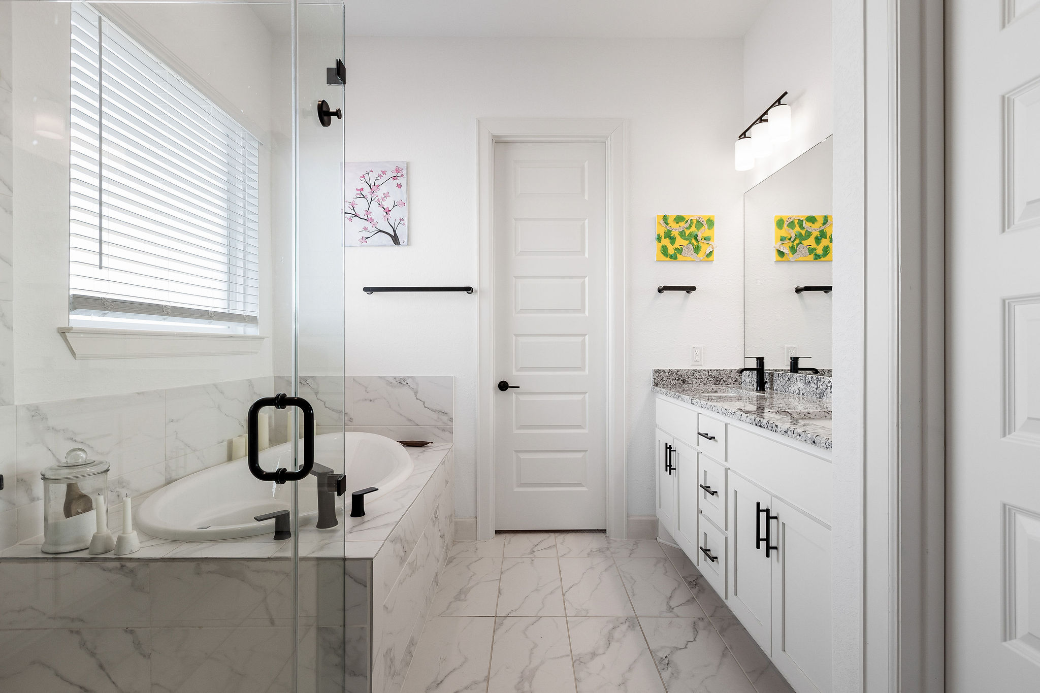 4605 Sea Salt Drive Austin, TX 78747 - Photo 25 of 40 a bathroom with a sink and a mirror