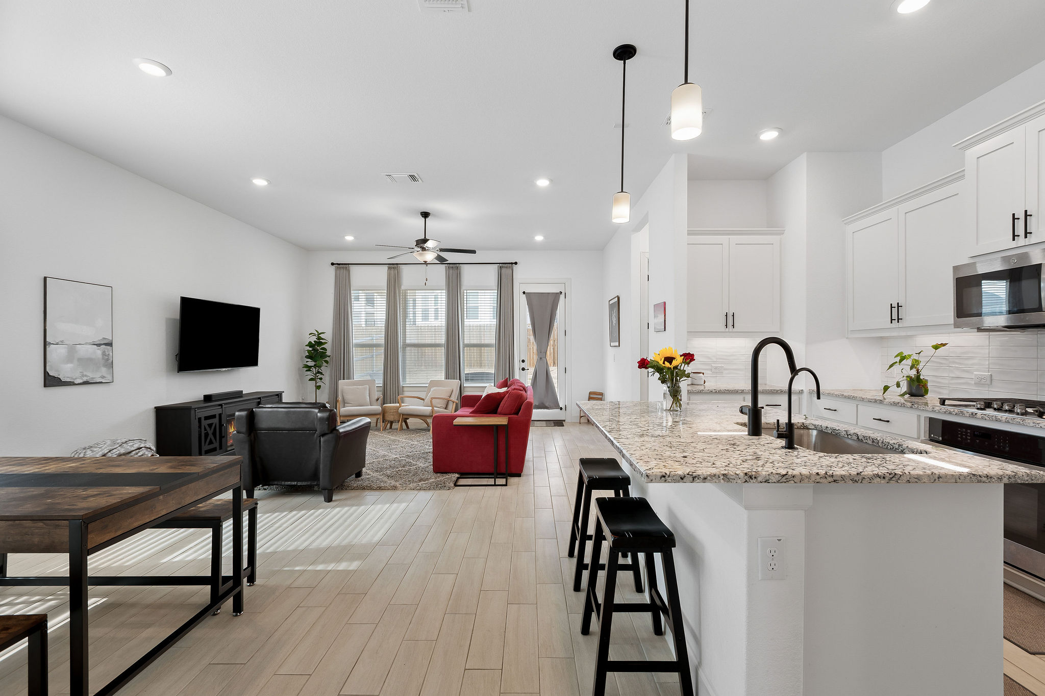 4605 Sea Salt Drive Austin, TX 78747 - Photo 3 of 40 a large kitchen with sink and a refrigerator
