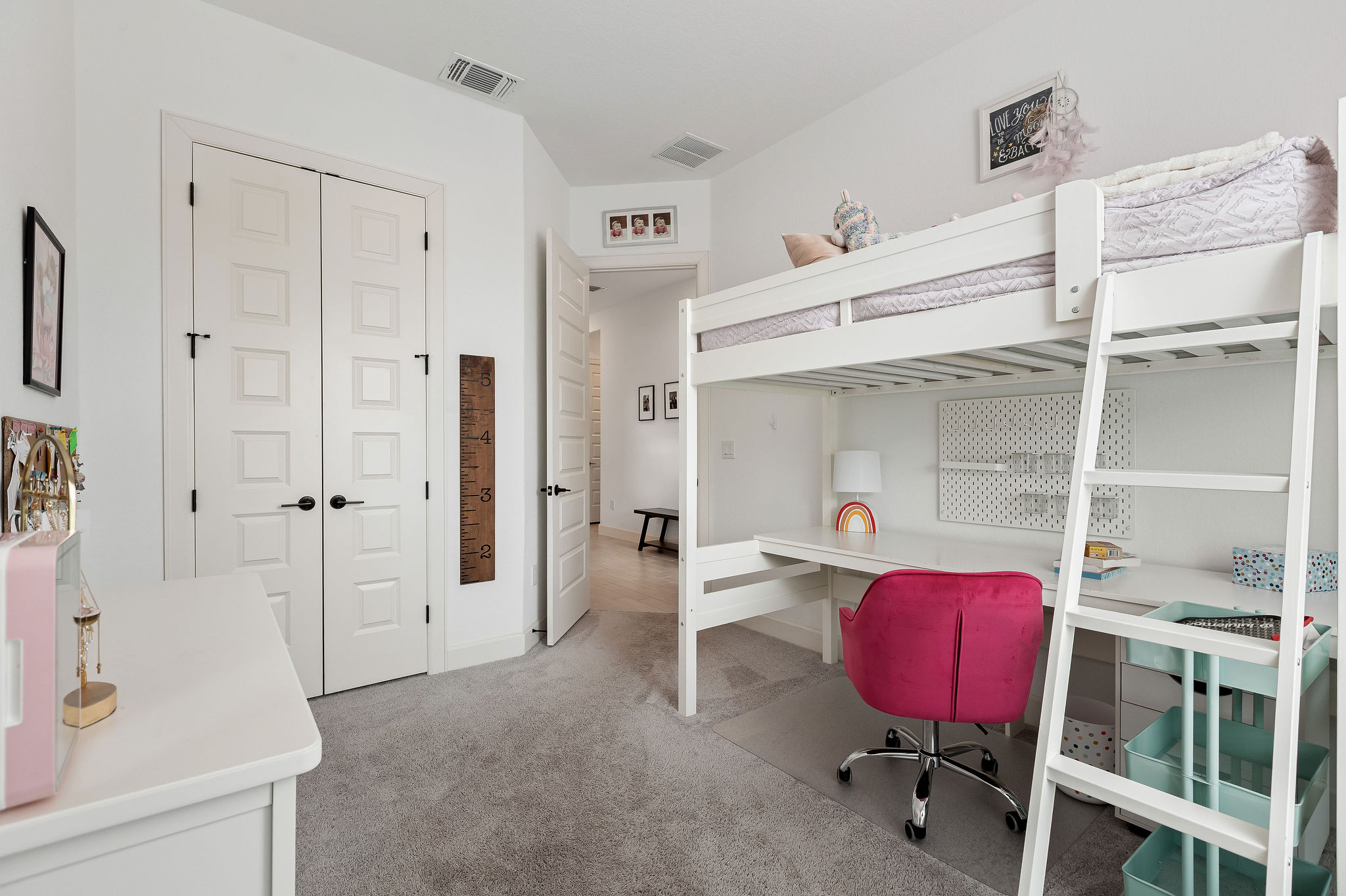 4605 Sea Salt Drive Austin, TX 78747 - Photo 33 of 40 a view of a livingroom with furniture and a bookshelf