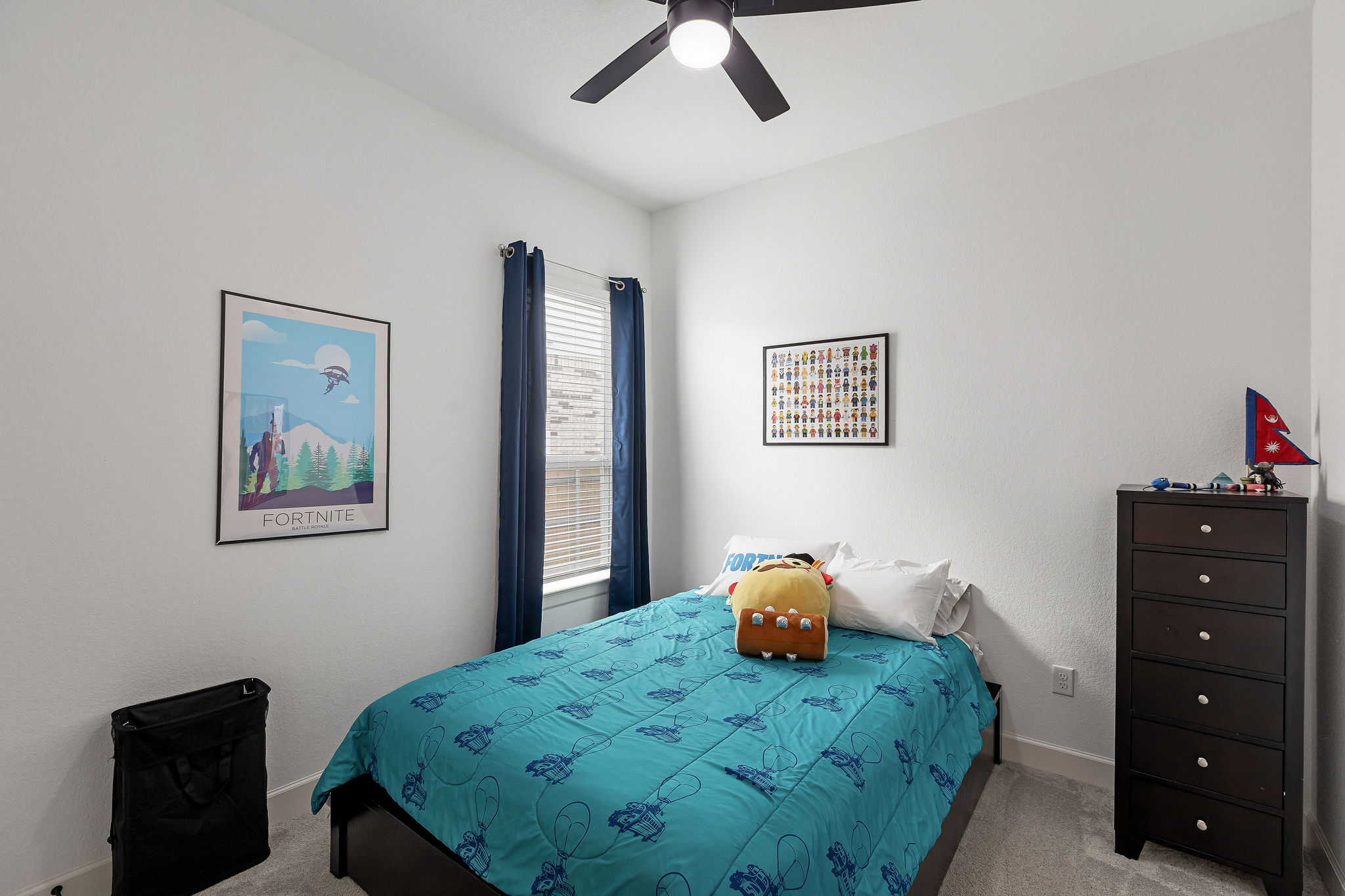 4605 Sea Salt Drive Austin, TX 78747 - Photo 35 of 40 a bedroom with a bed and a dresser