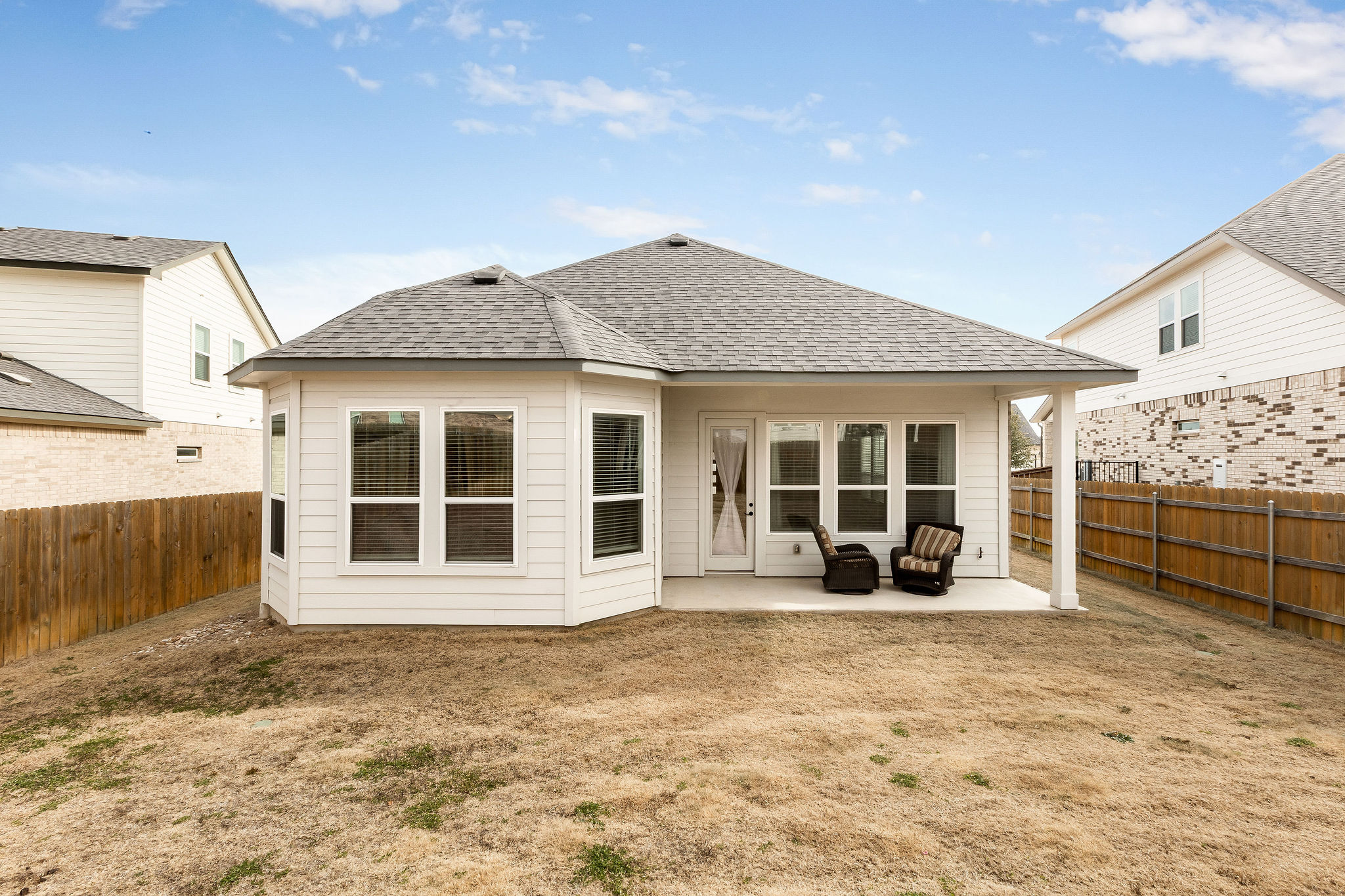 4605 Sea Salt Drive Austin, TX 78747 - Photo 39 of 40 a front view of a house with a large tree in front of it