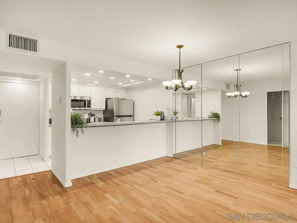 3634 7th Avenue, Unit 4B San Diego, CA 92103 - Photo 17 of 50 a view of a kitchen with a chandelier
