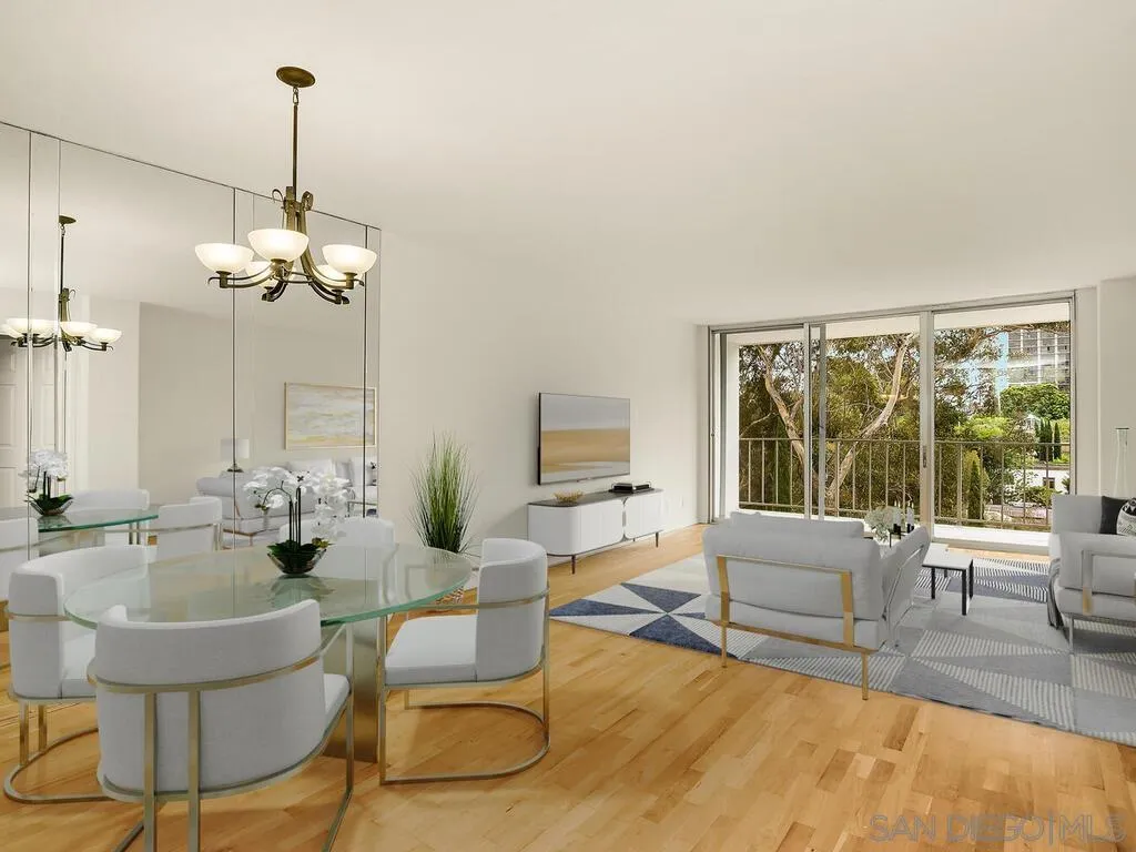 3634 7th Avenue, Unit 4B San Diego, CA 92103 - Photo 21 of 50 a living room with furniture and a large window