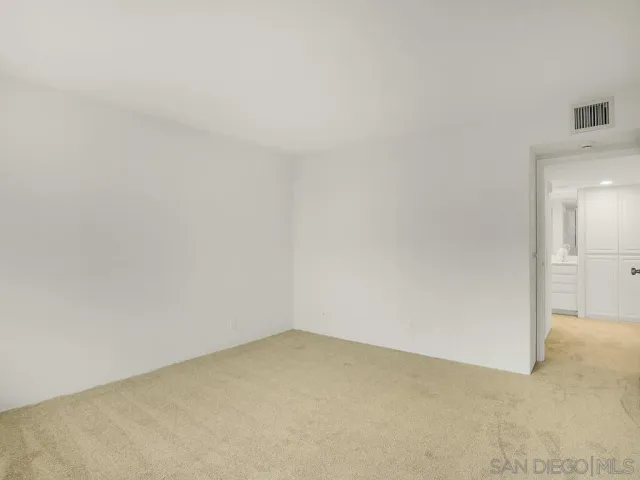 a bathroom with a shower curtain and a shower curtain