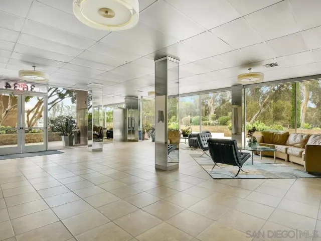 a outdoor space with patio area and glass windows