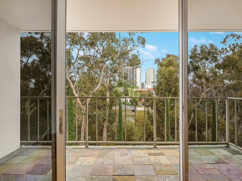 3634 7th Avenue, Unit 4B San Diego, CA 92103 - Photo 4 of 50 a view of a city from a hallway