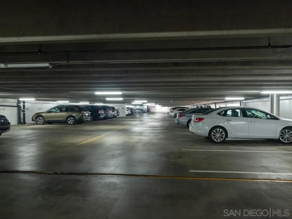 3634 7th Avenue, Unit 4B San Diego, CA 92103 - Photo 41 of 50 a view of parking garage with cars