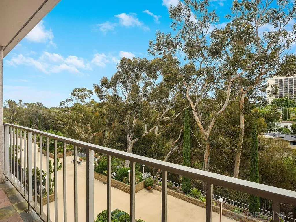 3634 7th Avenue, Unit 4B San Diego, CA 92103 - Photo 6 of 50 a view of a green field with trees in the background