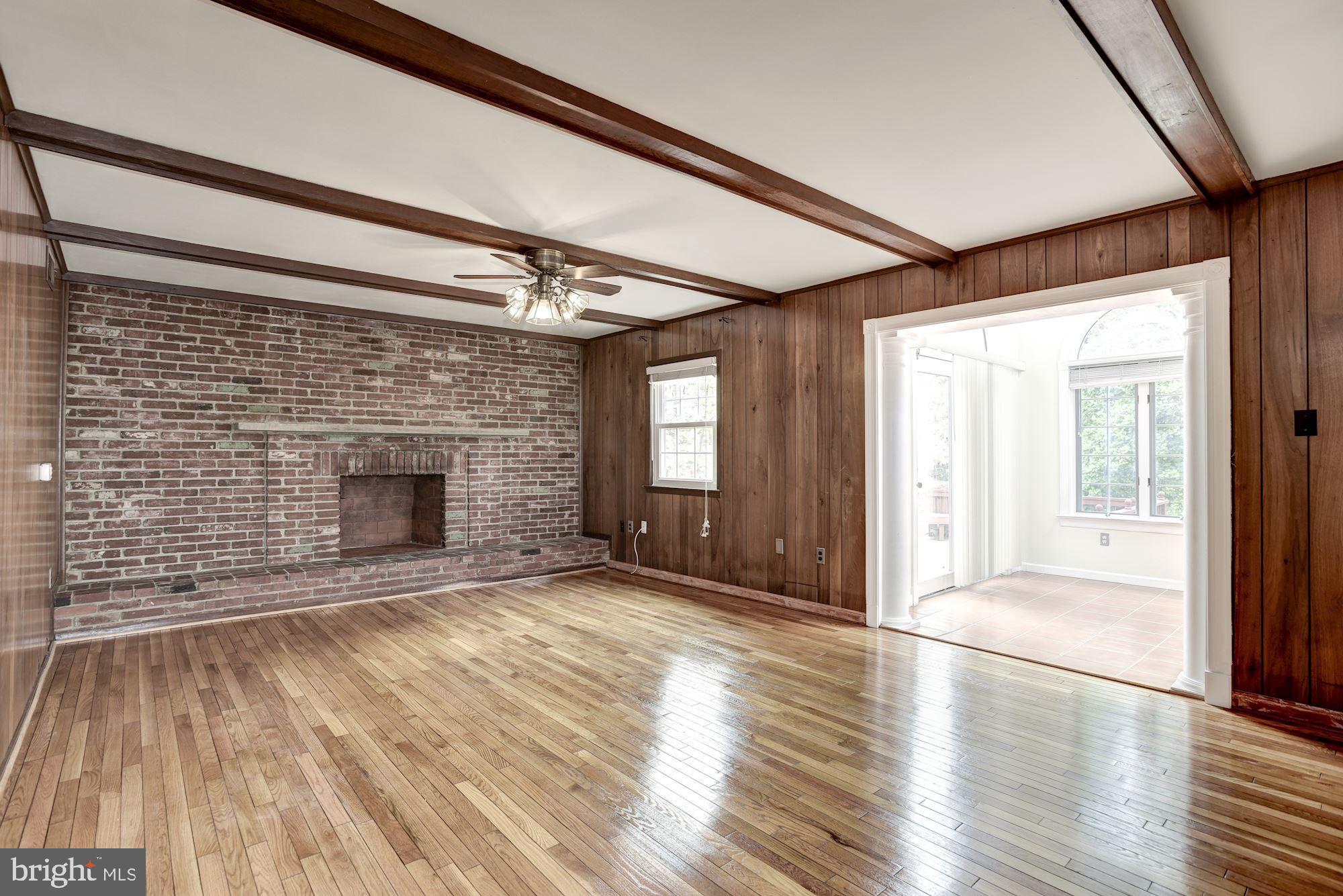 7327 Westerly Lane McLean, VA 22101 - Photo 16 of 35 Family room with fireplace opens to addition