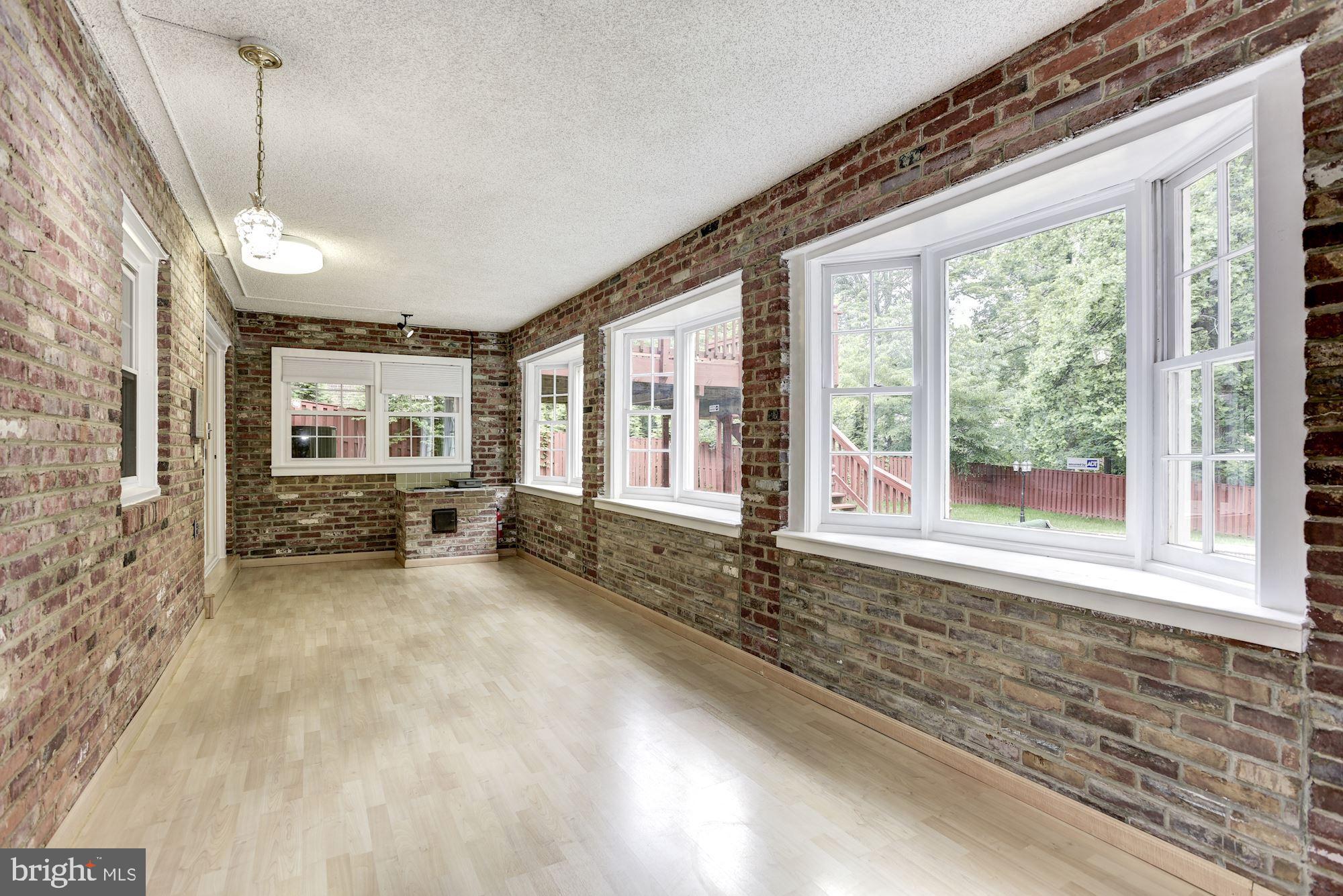 7327 Westerly Lane McLean, VA 22101 - Photo 29 of 35 LL pool/game room ; news windows & plank flooring