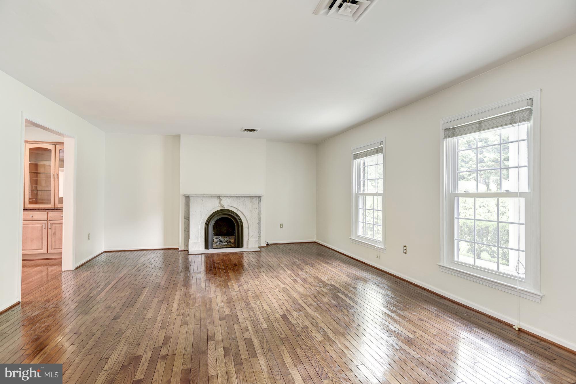7327 Westerly Lane McLean, VA 22101 - Photo 5 of 35 Living room with fireplace