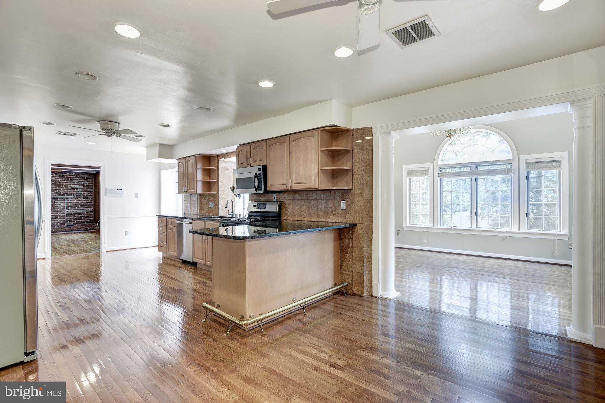 7327 Westerly Lane McLean, VA 22101 - Photo 8 of 35 Breakfast area opens to Sun Room addition