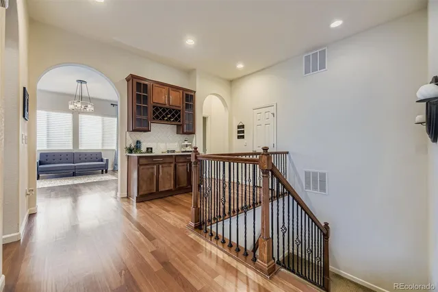 a view of a hallway with a kitchen