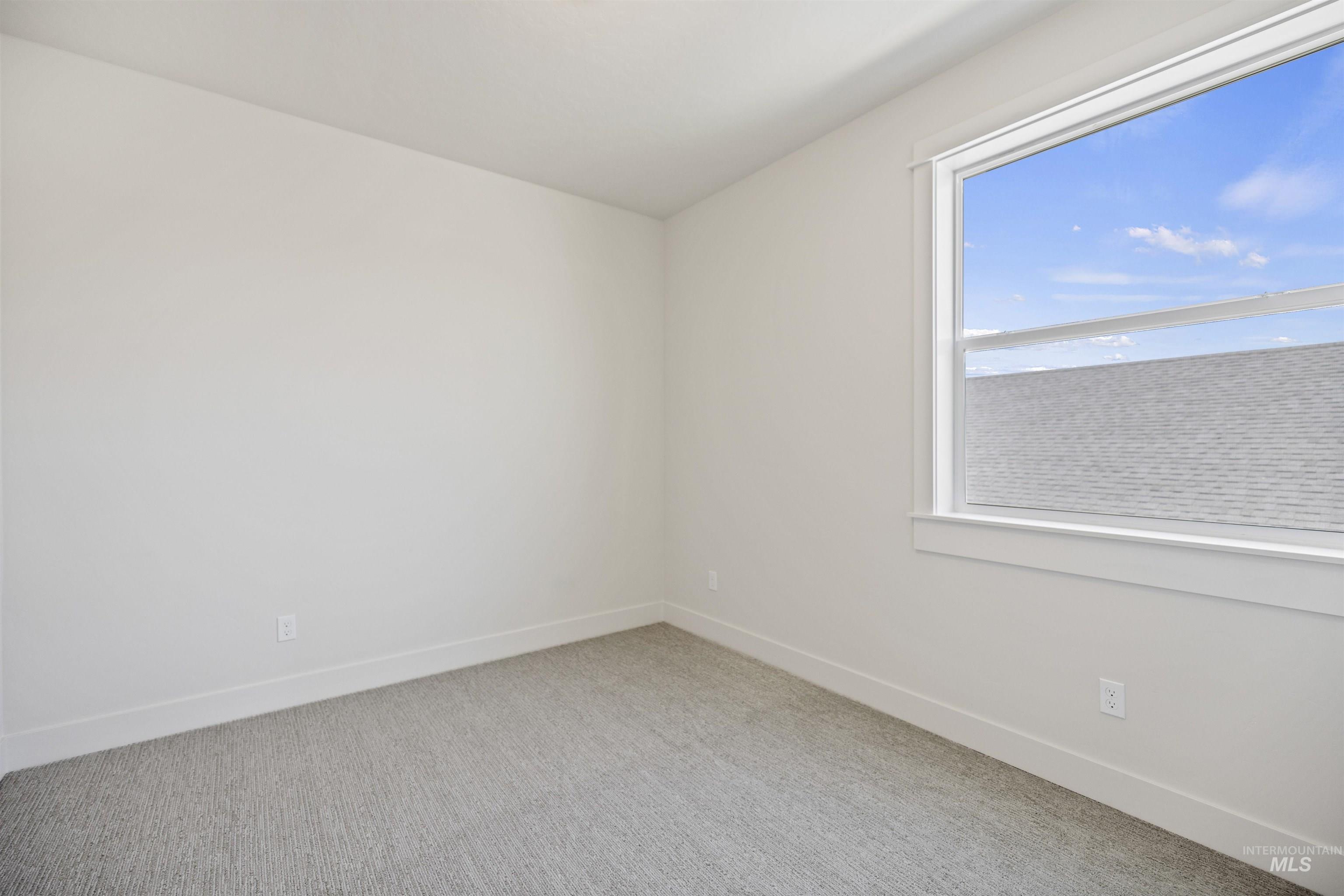 3515 South El Rio Avenue Boise, ID 83709 - Photo 24 of 47 Unfurnished room with carpet floors and baseboards