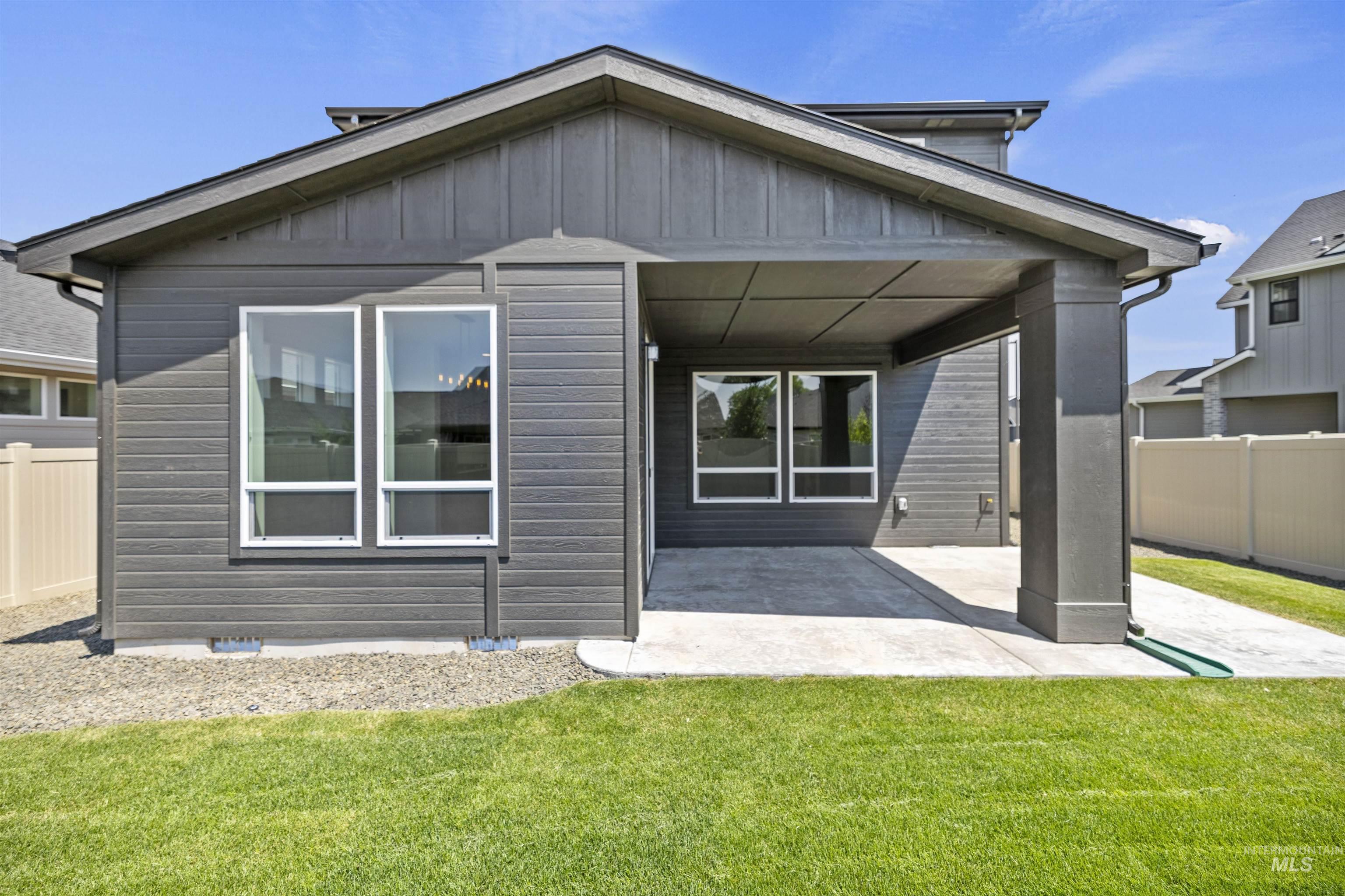 3515 South El Rio Avenue Boise, ID 83709 - Photo 44 of 47 Back of property featuring a patio area and board and batten siding