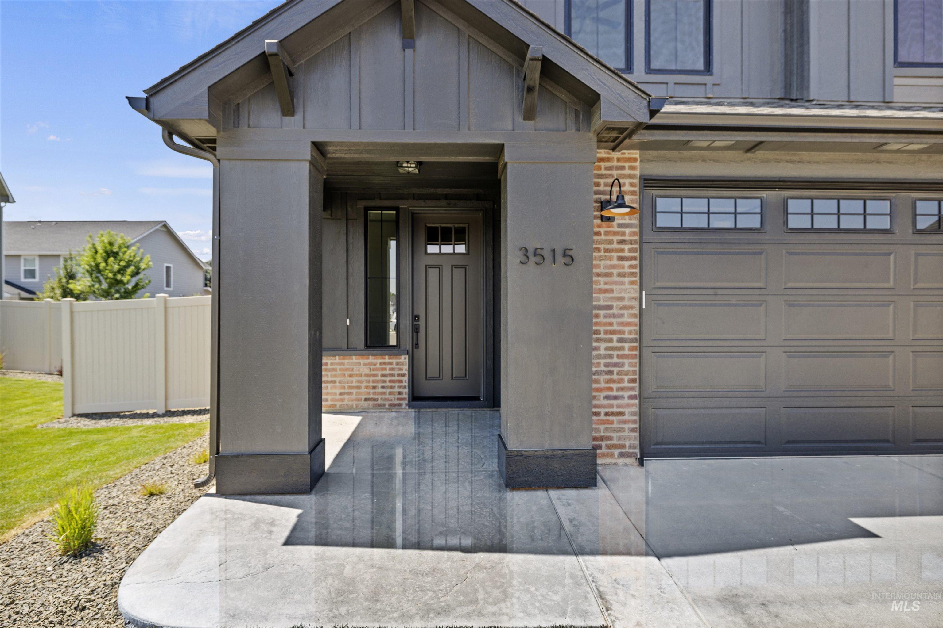 3515 South El Rio Avenue Boise, ID 83709 - Photo 5 of 47 Property entrance featuring brick siding and board and batten siding