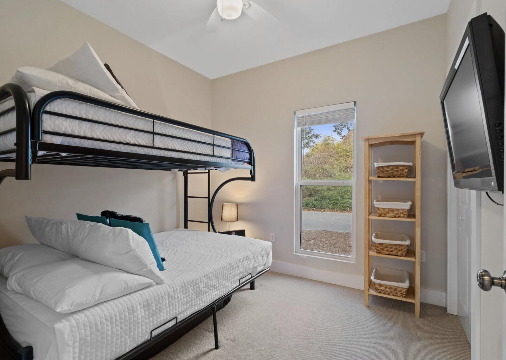 103 Cottage Way, Unit 13 Inlet Beach, FL 32461 - Photo 14 of 18 a bedroom with a bed and a window