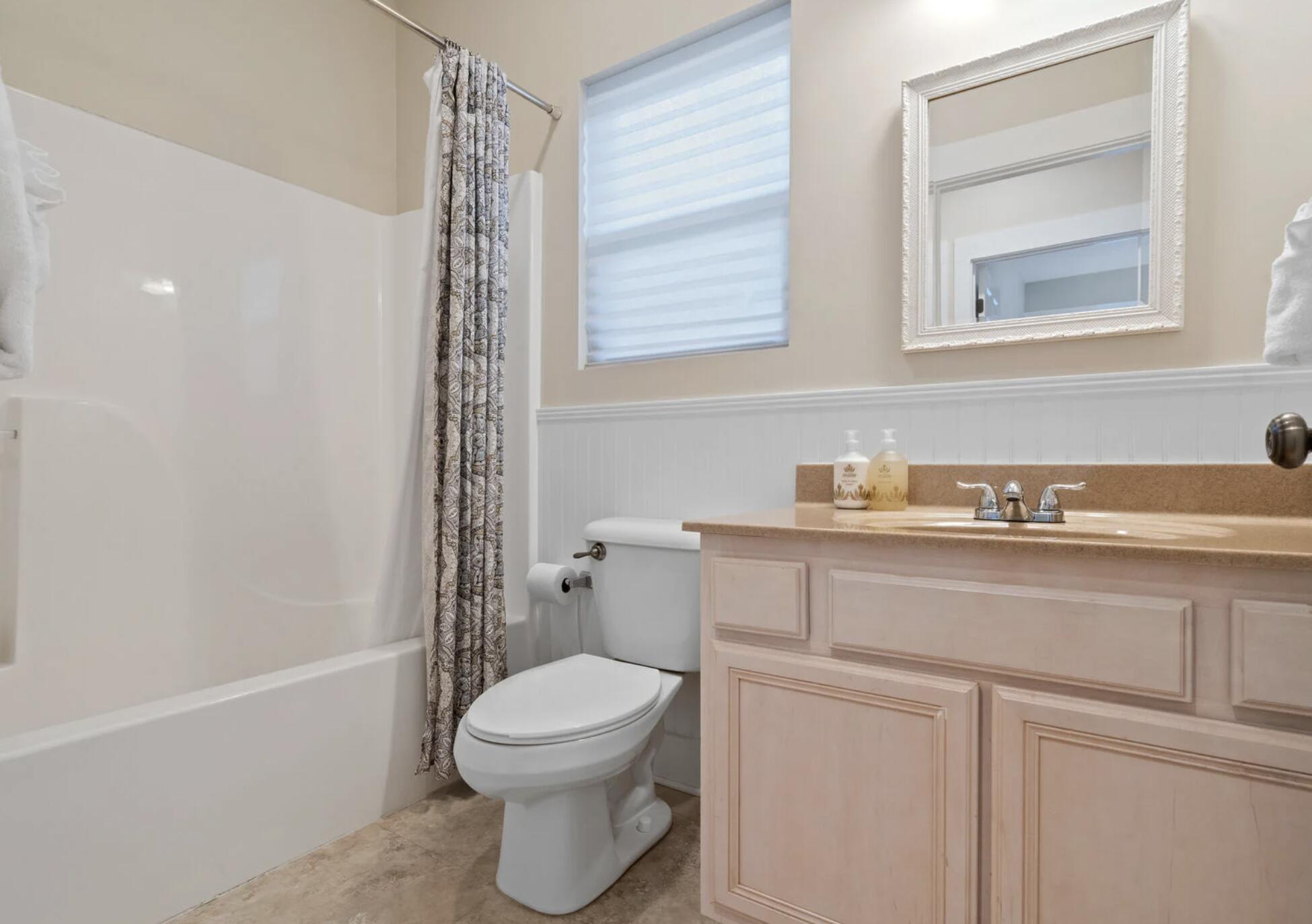 103 Cottage Way, Unit 13 Inlet Beach, FL 32461 - Photo 16 of 18 a bathroom with a sink a toilet and shower