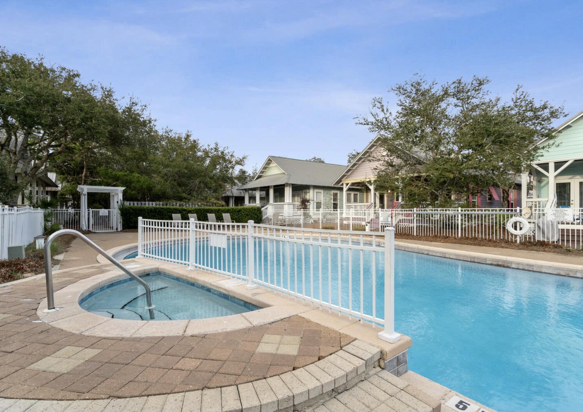 103 Cottage Way, Unit 13 Inlet Beach, FL 32461 - Photo 5 of 18 a view of a swimming pool with a patio