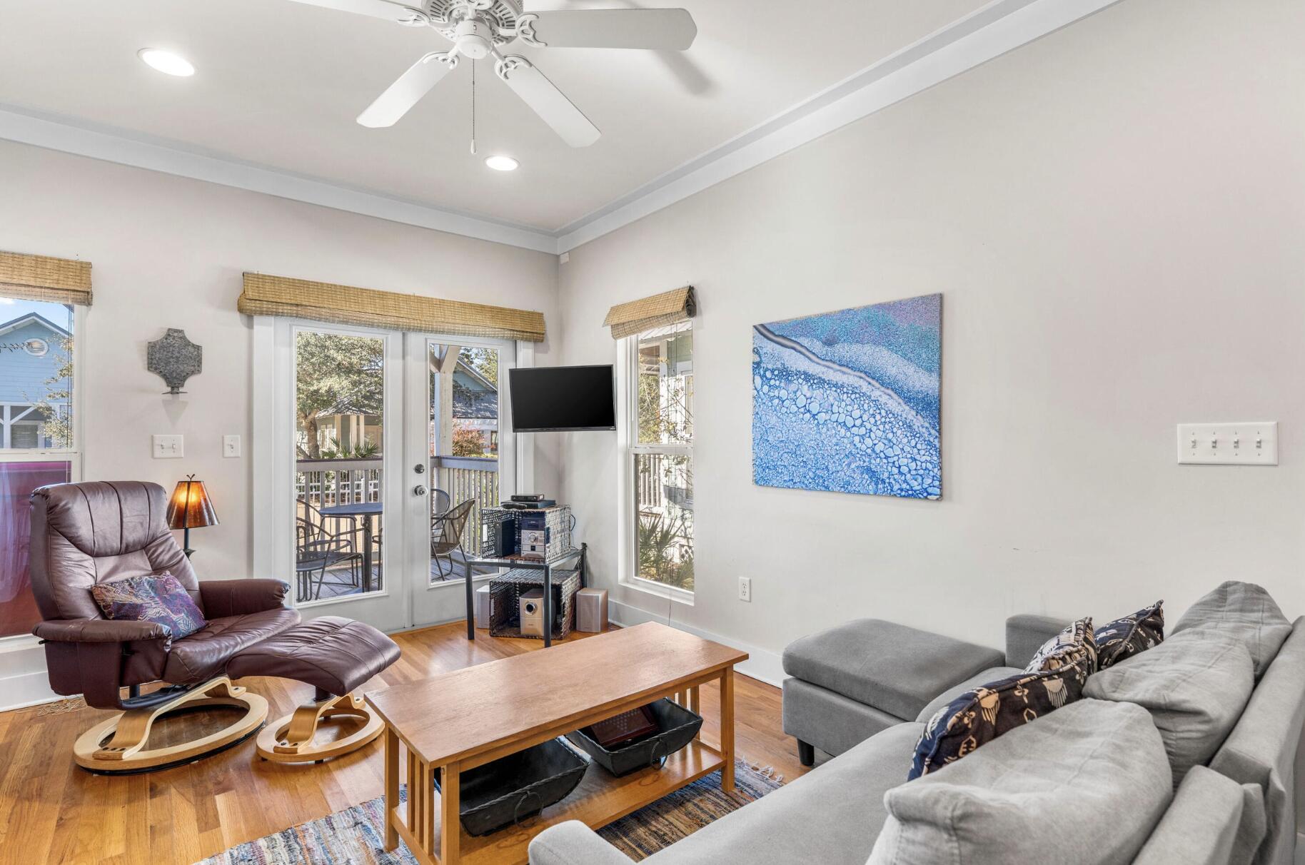 103 Cottage Way, Unit 13 Inlet Beach, FL 32461 - Photo 9 of 18 a workspace with furniture and a chandelier