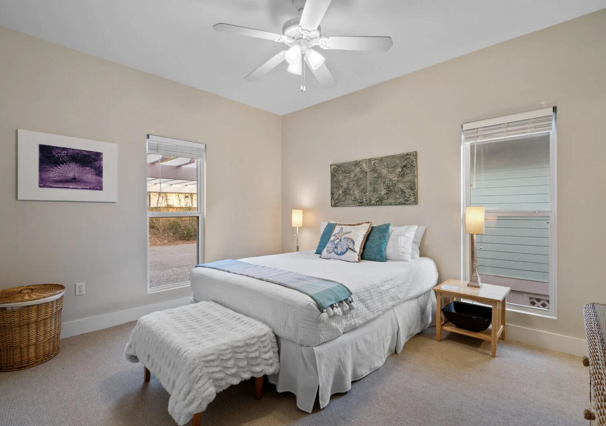 103 Cottage Way, Unit 13 Inlet Beach, FL 32461 - Photo 10 of 18 a bedroom with a bed and a chandelier