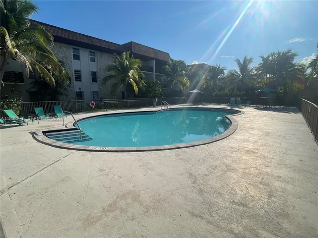 a view of outdoor space pool patio and yard
