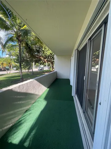 a view of backyard with green space