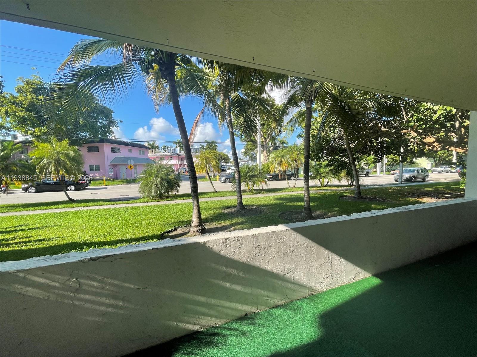 7483 Southwest 82nd Street, Unit A101 Miami, FL 33143 - Photo 36 of 39 a view of a park with large trees