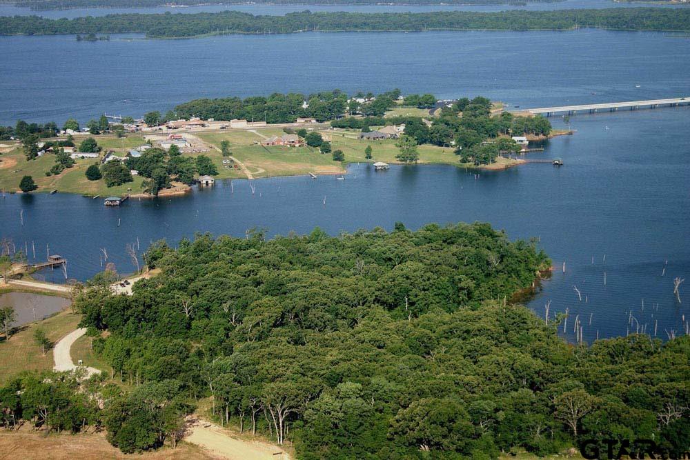 Lot 254-255 Choctaw & Kickapoo Quitman, TX 75783 - Photo 12 of 14 a view of a lake with a yard